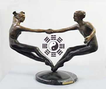 couple in a beautiful dance of opposition with a yin yang symbol at center